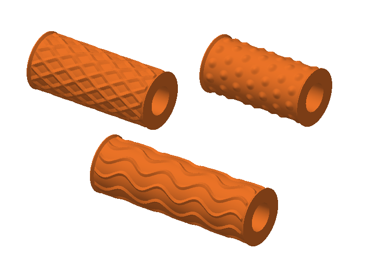 Three orange texture rollers with diamond, dot and wave patterns
